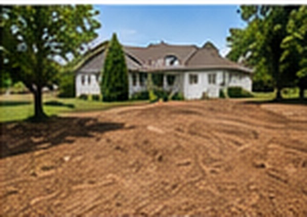 Freshly graded lot in front of a home